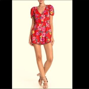 Row A. Red Floral Drape Sleeve, Tie Back Romper. Size Medium.